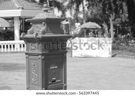 Red vintage post box(black and white photo)