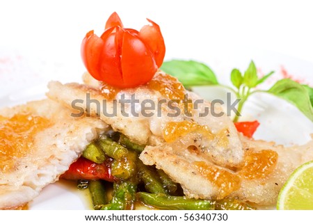 halibut filet roast at lime juice and vegetables