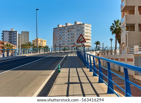 The 53 m long Bascule bridge of La Manga (La Manga del Mar Menor), in summer timetable it raises eight times a day. Region of Murcia, Spain.