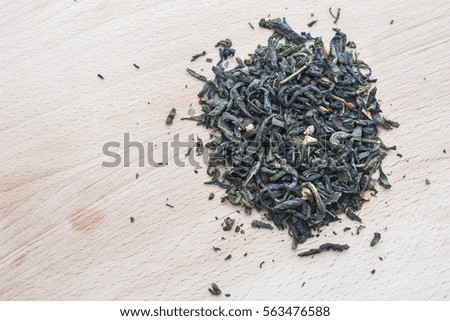 green tea on wooden background. studio shot