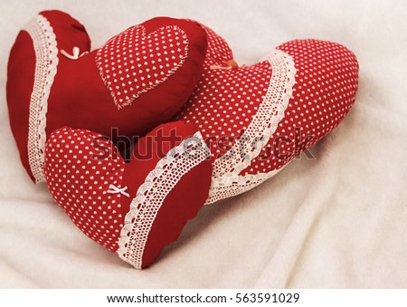 Handmade jewelry on Valentine's Day. Red heart.
