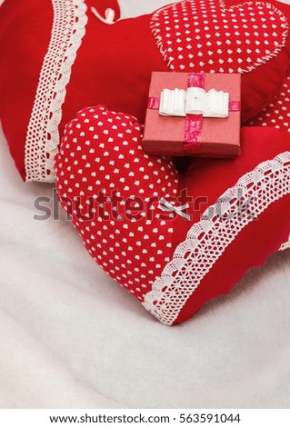 Handmade jewelry on Valentine's Day. Red heart.