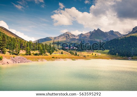 Beautiful summer morning on the Speicher lake. Colorful outdoor scene in western Austrian Alps, in the district of Innsbruck-Land in the state of Tyrol, Austria, Europe. 