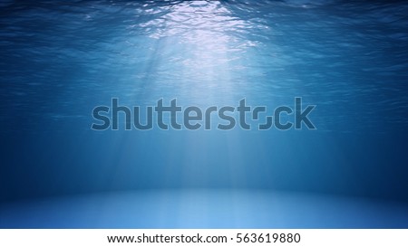 Blue ocean surface seen from underwater. Abstract Fractal waves underwater and rays of sunlight shining through Royalty-Free Stock Photo #563619880