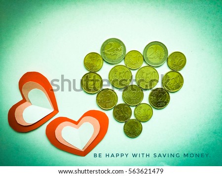 Overlapping cutting paper red hearts and euro money isolated on green background. You can use as greeting card with text or with out text "Happy Valentine's Day"
I love to saving money.