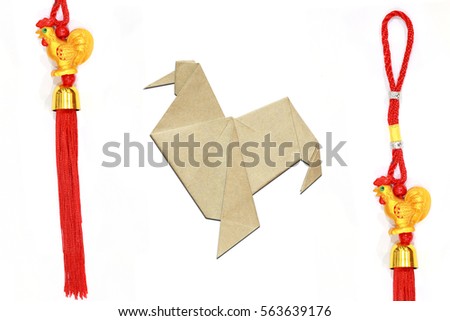 Paper folded rooster handmade origami and Lucky knot for Chinese New Year 2017 decoration Rooster means fortune.  2017 is year of the Rooster. Nice natural holiday greeting card, postcard.