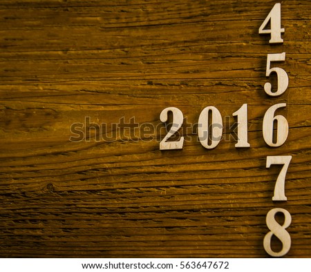 2016 on wooden table background