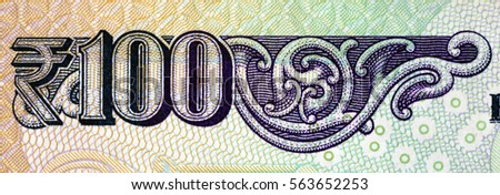 detail of indian banknote - protective pattern and nominal figures Royalty-Free Stock Photo #563652253