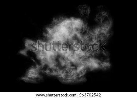 White cloud isolated on black background. Textured smoke, brush effect Royalty-Free Stock Photo #563702542