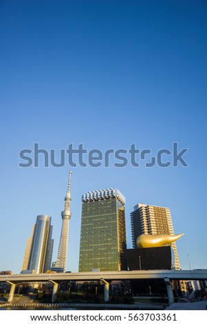 Skyline of Sumida Ward, Tokyo, Japan with landmarks including the new Tokyo Sky Tree and Asahi Brewery Headquarters.
