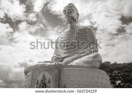 The statue of Big Buddha at temple in Thailand, buddhism concept, used amulets of Buddhism religion, Black and white picture of Buddha statue