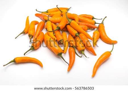 yellow chili pepper isolated on a white background and texture