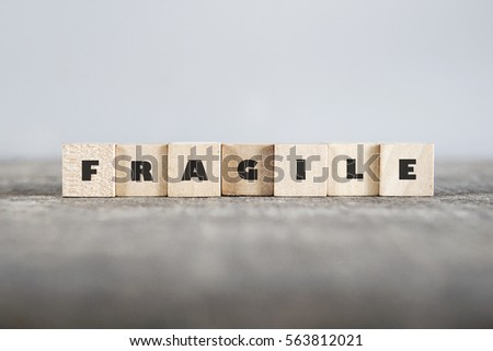 FRAGILE word made with building blocks