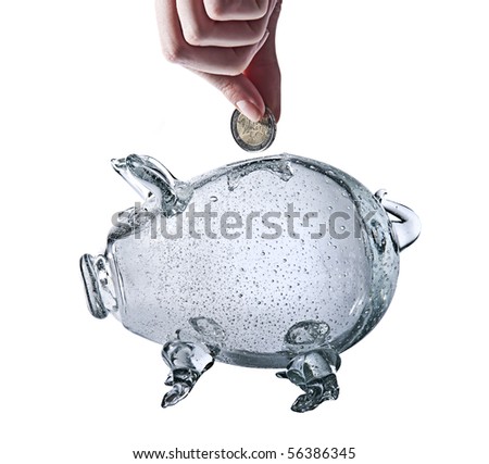 photo of glass piggy bank on white background