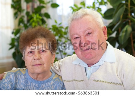 Picture of a happy elderly couple at home