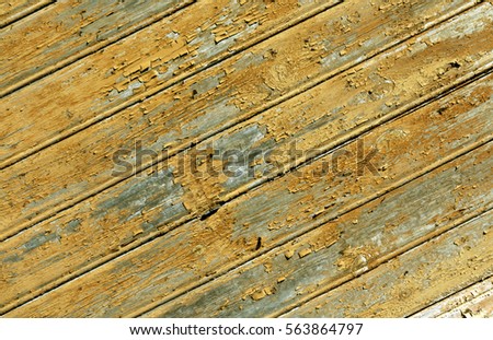 Weathered orange painted wooden wall texture. Abstract background and texture for design.