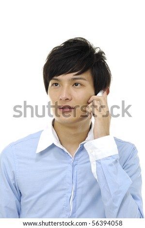 Young happy man talking on a mobile phone, isolated on white