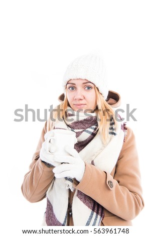 Girl with a cup of tea in the winter
