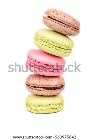 Large stack falling of multicolored macaroon on a white background