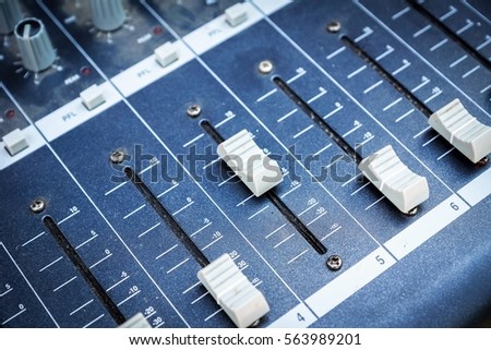 old dusty audio mixing board 