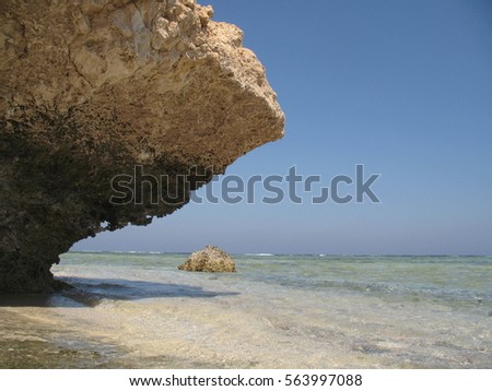seaside view, white sand beach with clear sea blue water, summer holidays in Egypt