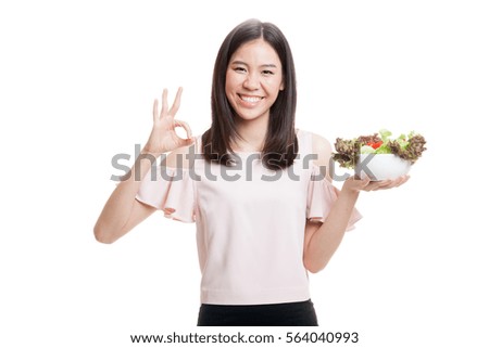 Healthy Asian business woman show OK with salad  isolated on white background.