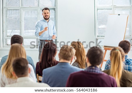 Speaker at Business Meeting in the conference hall. Royalty-Free Stock Photo #564043186
