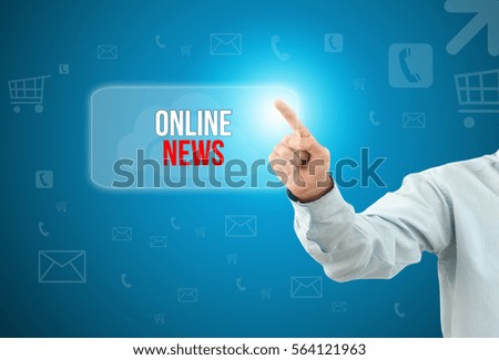 Business man touch a button on an imaginary screen with text ONLINE NEWS