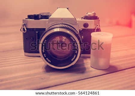 Vintage Film Camera with Container of Film