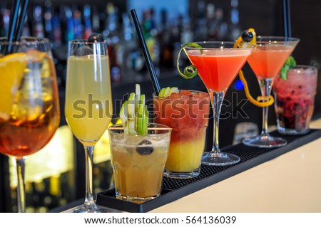 cocktails drinks on bar Royalty-Free Stock Photo #564136039
