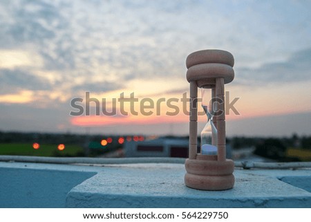 hourglass on the twilight sky