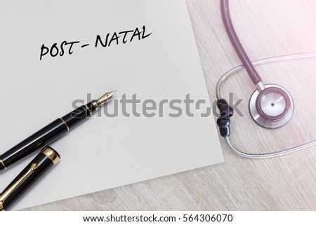 Post - Natal word with stethoscope and pen on wooden background as medical concept
