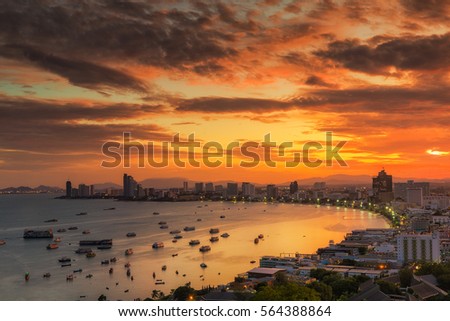 Seascape and sunrise over Pataya beach. Pataya city and Pataya port, Chonburi, Thailand Royalty-Free Stock Photo #564388864