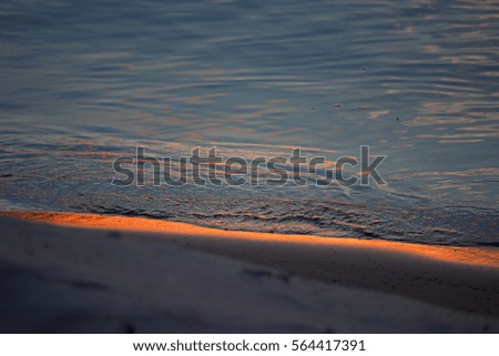 sun reflecting in the waves, close up