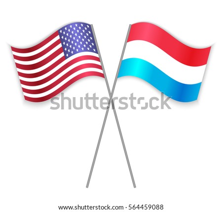 American and Luxembourgish crossed flags. United States of America combined with Luxembourg isolated on white. Language learning, international business or travel concept.