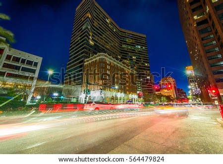 New Orleans street and buildings at night, Louisiana, USA.