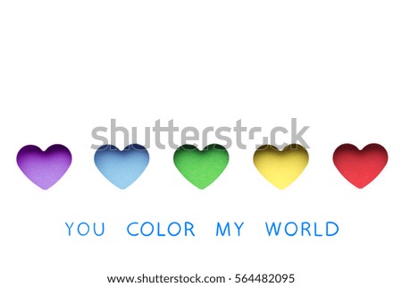 Creative valentines concept photo of colored hearts on white background.