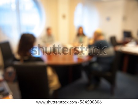 Business People Meeting Conference Discussion Corporate Concept. Blur abstract background of employees Young colleagues sitting at the business meeting in the office