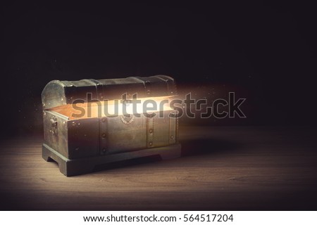 Pandora's box with smoke on a wooden background Royalty-Free Stock Photo #564517204