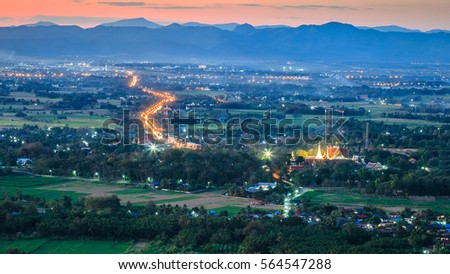 Cityscape twilight sunset at view point Doy Leng temple Phrae Thailand.