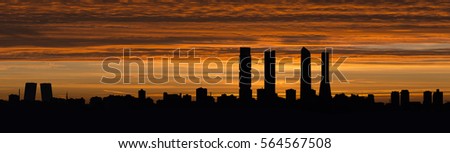 Skyline of Madrid at dusk Royalty-Free Stock Photo #564567508