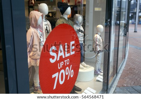 discount prices in children fashion clothing shop during sale