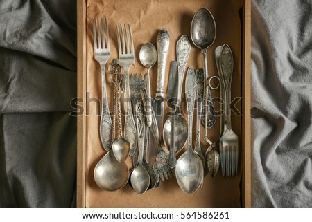 Set of silverware in wooden box