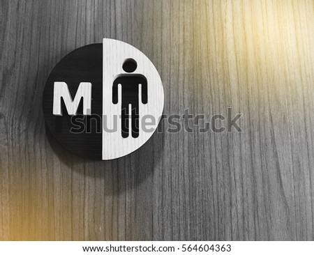 Toilets icon, Public restroom signs ,Toilet sign and direction on wooden background.