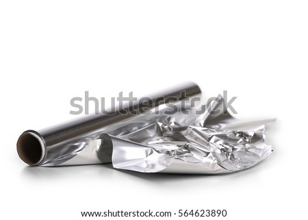  aluminum foil on white background  Royalty-Free Stock Photo #564623890