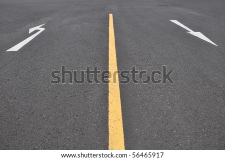 turn arrow on the asphalt road
