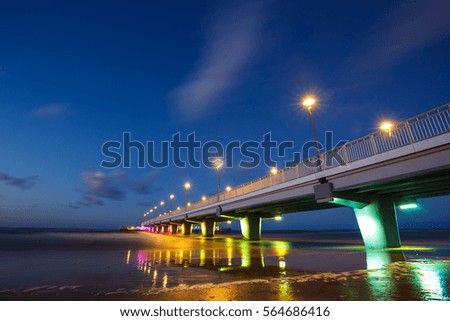 Concrete pier in Kolobrzeg, long exposure shot at sunset