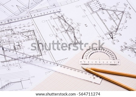 Workplace of architect. Architectural design, sketch, drawing paper, drawings, simple pencil, transparent ruler with protractor on the table