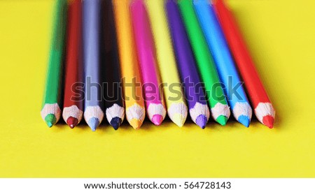 coloured pencils pastels on a colour background isolated