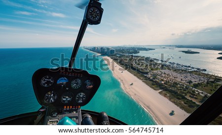 Panoramic view of South Beach in a sunny day from the helicopter. South Beach (also known as SoBe), is one of the more popular areas of Miami Beach. 